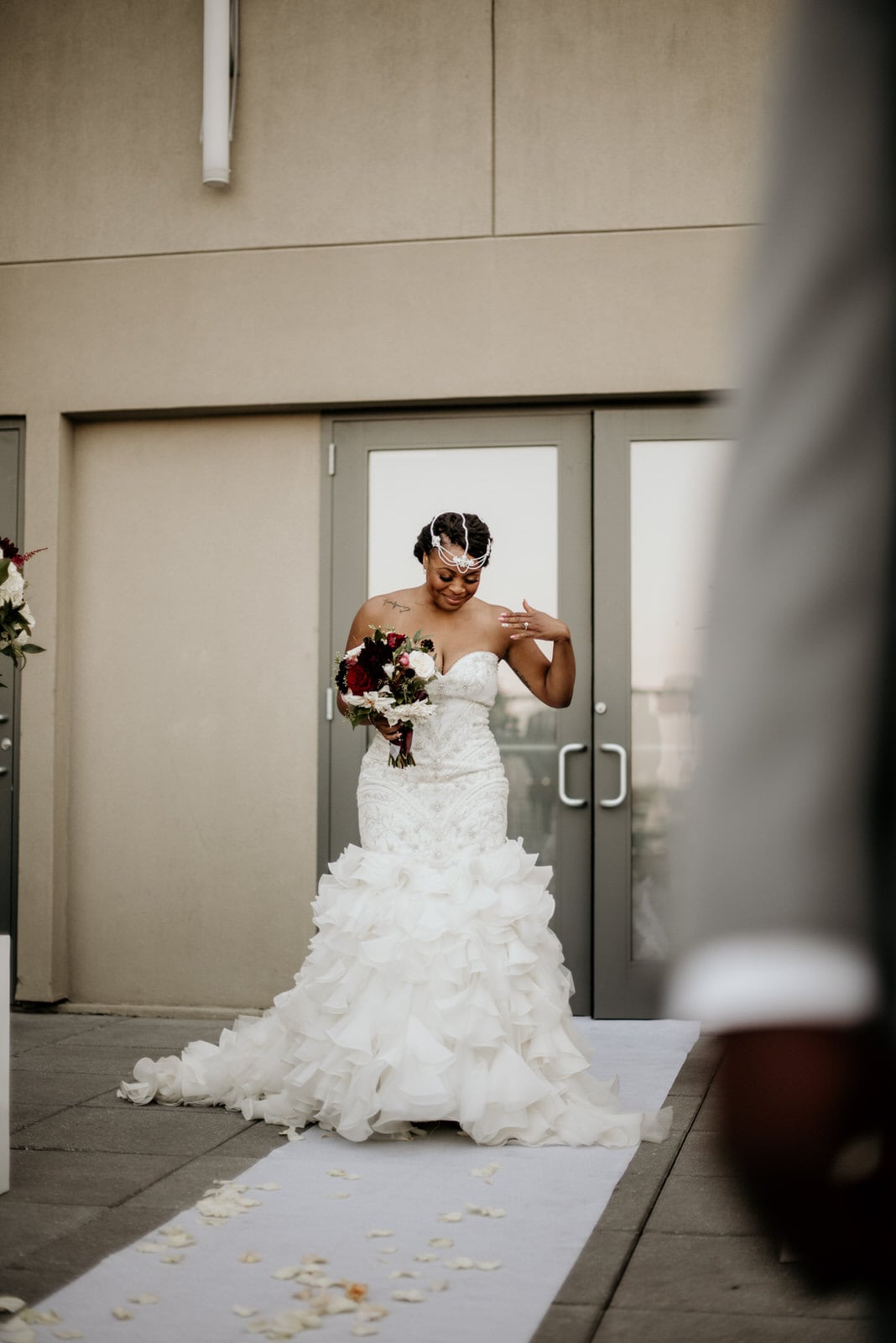 Bride overwhelmed with emotion walking down the aisle